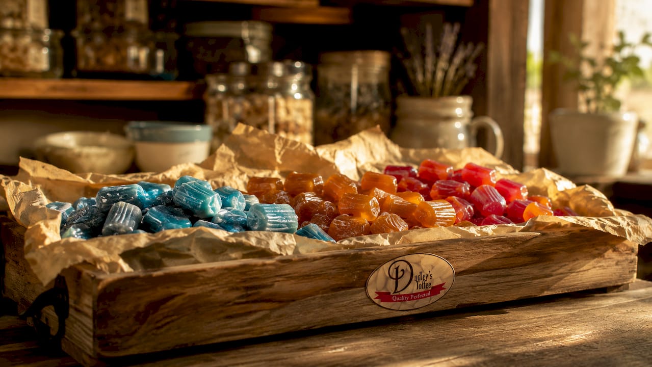 Assorted soft chewy candies on rustic wooden board
