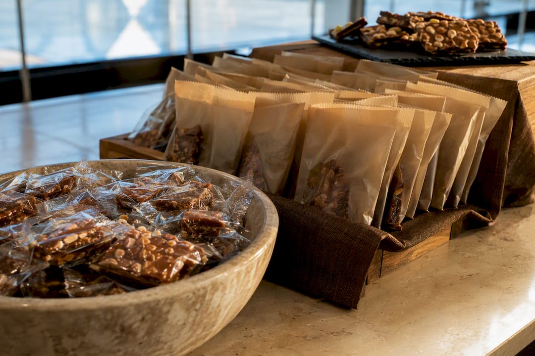 Tiered food giveaway display at trade show booth